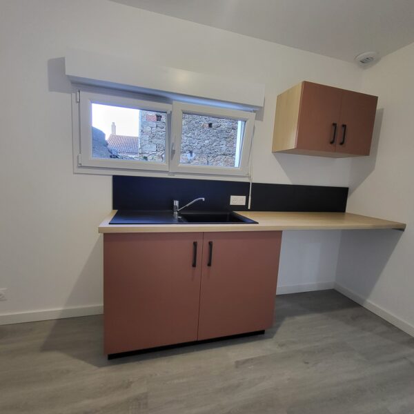 Agencement d'une arrière cuiqine pour une maison locative